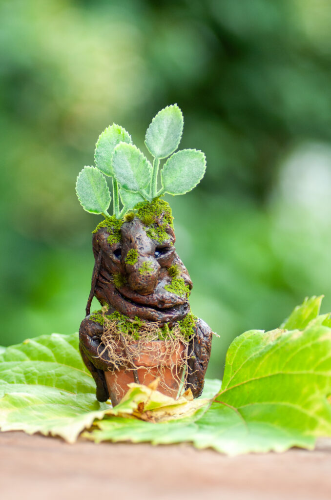 Rootling magical plant creature, living sprout in a pot